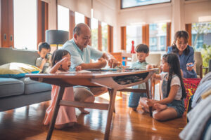 Family playing board games together 