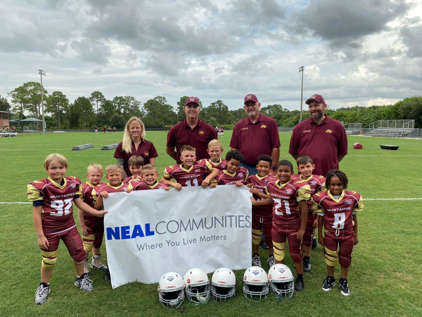 Neal Communities makes $1,000 donation to North Port Mustangs Pop Warner