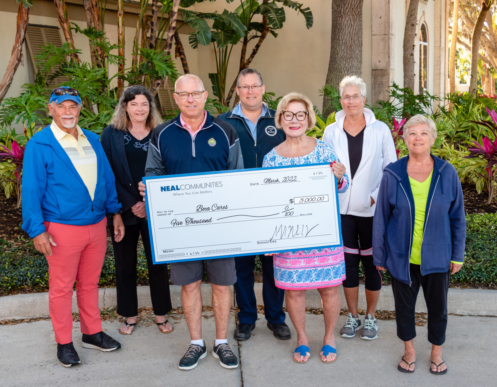 Neal Communities makes $5,000 donation to Boca Cares at Boca Royale Golf & Country Club