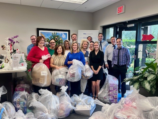 Neal Communities Employees Donate Hundreds of Gifts to  Salvation Army Angel Tree Program and Toys for Tots Toy Drive