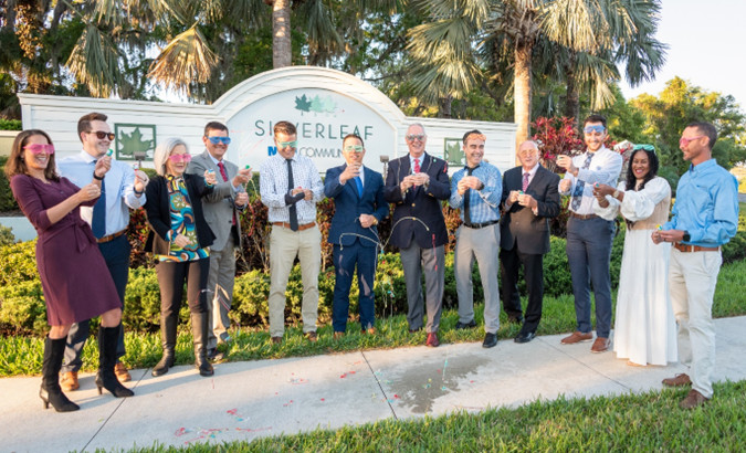 The Neal Communities team celebrates the close-out of Silverleaf in Lakewood Ranch, meaning the last home has been completed, sold and turned over to the new owners. 