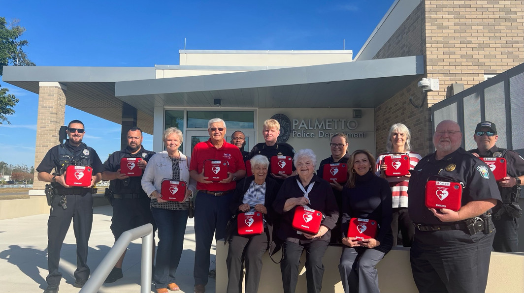 Neal Communities Funds $10,000 for 40 Defibrillators for the Palmetto Police Department